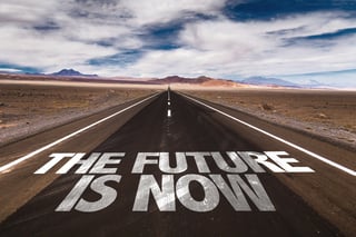 The Future is Now written on desert road.jpeg